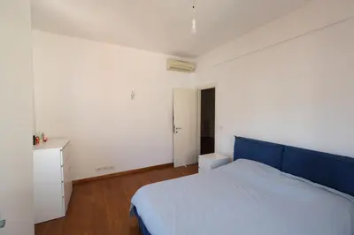 Letto o letti in una camera di Casa di Rawi by PortofinoVacanze