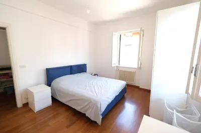 Letto o letti in una camera di Casa di Rawi by PortofinoVacanze