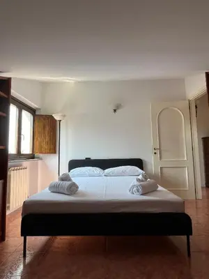 Letto o letti in una camera di Mansarda Lucia