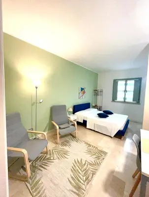 Letto o letti in una camera di CASA MULINA SUITE- Centro storico
