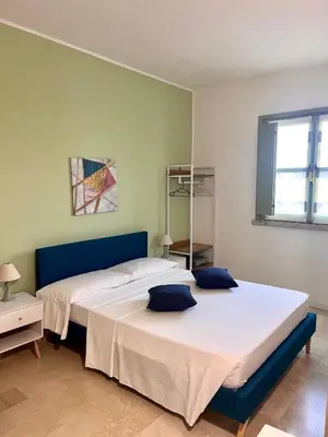 Letto o letti in una camera di CASA MULINA SUITE- Centro storico