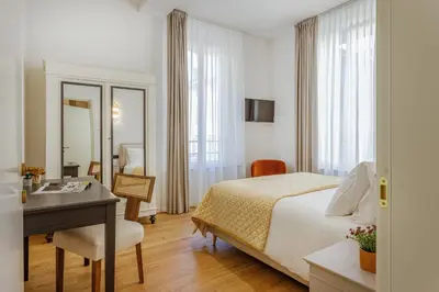 Letto o letti in una camera di Dimora d'Autore - Charm in the Heart of Modena
