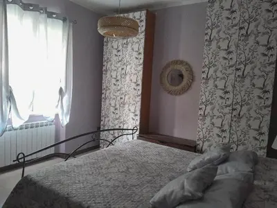 Letto o letti in una camera di Vecchio Borgo Villa Oneto