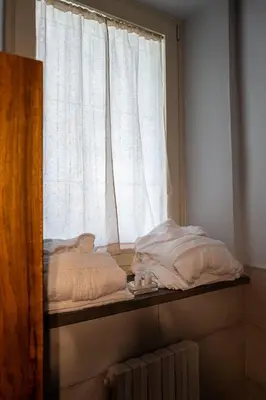 Letto o letti in una camera di La Rocchetta - in centro storico Parma