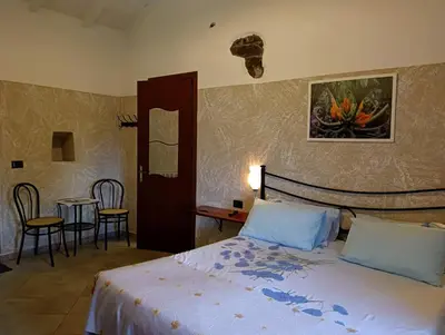 Letto o letti in una camera di Terra Del Bosco Agriturismo