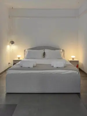 Letto o letti in una camera di Arazzo Apartments