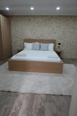 Letto o letti in una camera di Casa Nika