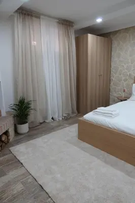 Letto o letti in una camera di Casa Nika