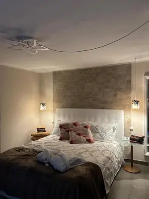 Letto o letti in una camera di Villa Luce