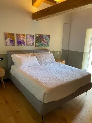 Letto o letti in una camera di B e B Villa Livia