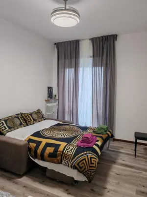 Letto o letti in una camera di Casa ALFRED FIDENZA