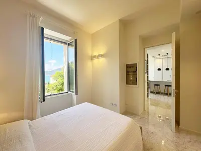 Letto o letti in una camera di Sea Whisper by PortofinoVacanze