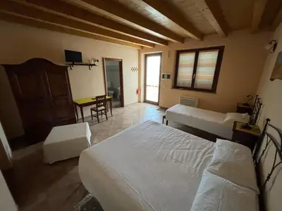 Letto o letti in una camera di Agriturismo Cascina Serzego