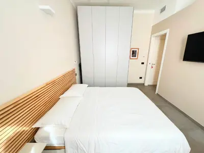 Letto o letti in una camera di Red Collection, Boutiques Rooms & Suites, Modena City Center