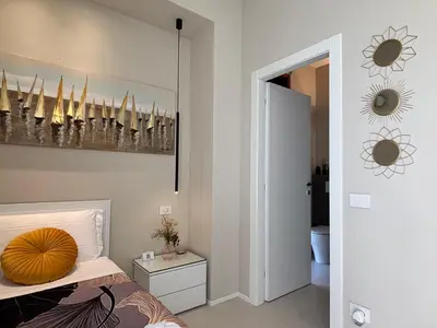 Letto o letti in una camera di Salotto Santa Franca
