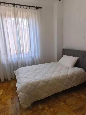 Letto o letti in una camera di Regina Margherita Apartment