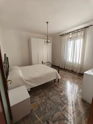 Letto o letti in una camera di Regina Margherita Apartment