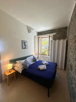 Letto o letti in una camera di Mare di Luna - AC - WiFi - Garden - 2 Parking Spaces