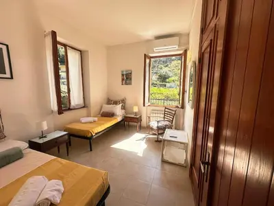Letto o letti in una camera di Mare di Luna - AC - WiFi - Garden - 2 Parking Spaces