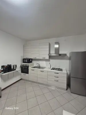 Cucina o angolo cottura di Confortevole alloggio