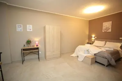 Letto o letti in una camera di Guest Holiday Gambara 1 e 2