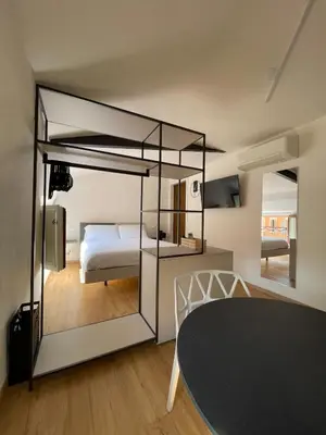 Letto o letti in una camera di Monolocale in centro Modena Pomposa Hideaway