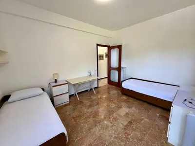 Letto o letti in una camera di A 2 passi dal mare