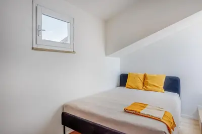 Letto o letti in una camera di Respiro di Ghirlandina - Rua Frati 34 Palace by MoVeBNB
