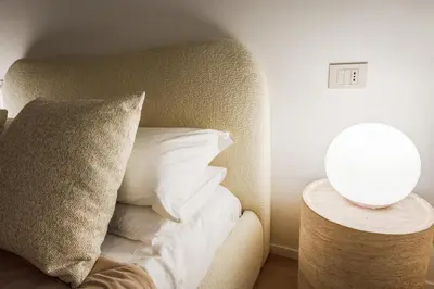 Letto o letti in una camera di Fumo di Lambrusco - Rua Frati 34 Palace by MoVeBNB