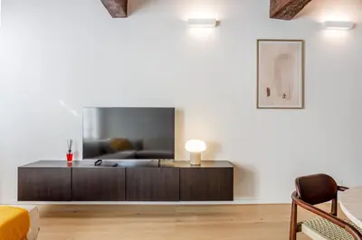 Area soggiorno di Nebbia sul Naviglio - Rua Frati 34 Palace by MoVeBNB