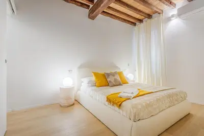 Letto o letti in una camera di Nebbia sul Naviglio - Rua Frati 34 Palace by MoVeBNB