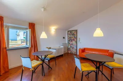 Area soggiorno di Cava Ardè Rooms