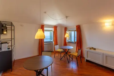 Area soggiorno di Cava Ardè Rooms