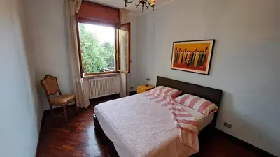 Letto o letti in una camera di Book Paradise