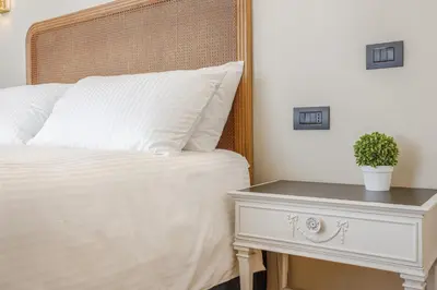 Letto o letti in una camera di Dimora d'Autore - Timeless Elegance in Modena