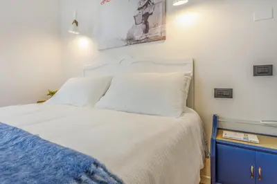 Letto o letti in una camera di Dimora d'autore - L'arte di Vivere Modena
