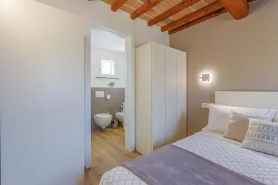 Letto o letti in una camera di Corso Adriano 13 - I Portici
