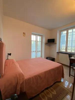 Letto o letti in una camera di L'angolo di Chiavari