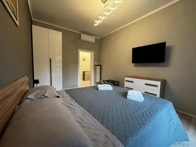 Letto o letti in una camera di Dream House
