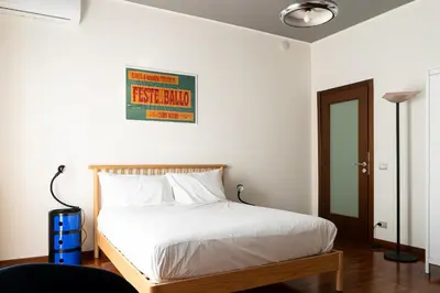 Letto o letti in una camera di MA SE PIACENZA - Pontenure
