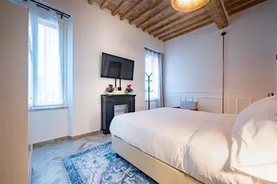 Letto o letti in una camera di GuestHost - Bixio 29 Apartments 3 and 5