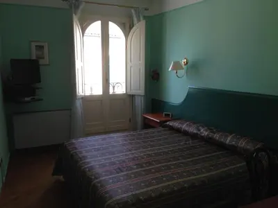 Letto o letti in una camera di Hotel San Genesio