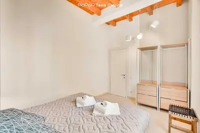 Letto o letti in una camera di Timeless, Terre Marine