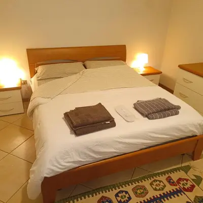 Letto o letti in una camera di B&B La Volta Buona