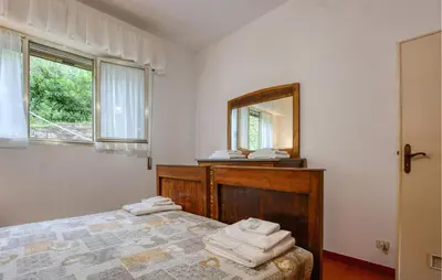 Letto o letti in una camera di 1 Bedroom Awesome Apartment In San Saturnino