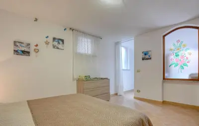 Letto o letti in una camera di 1 Bedroom Stunning Apartment In Masso