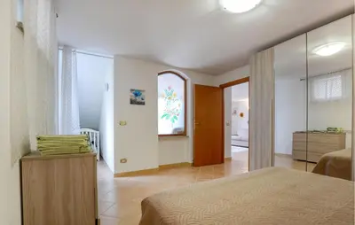 Letto o letti in una camera di 1 Bedroom Stunning Apartment In Masso