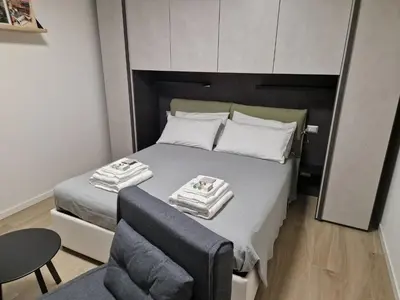 Letto o letti in una camera di B&B Casa Tassoni