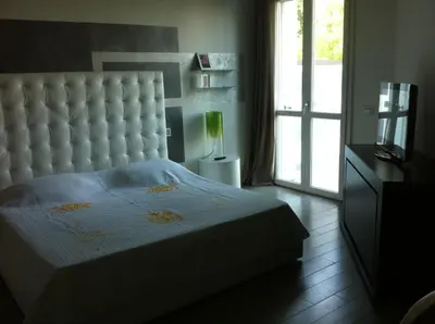 Letto o letti in una camera di Alla casa del Betto