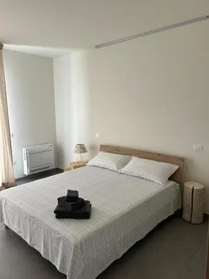 Letto o letti in una camera di B&B Bozzini's Nest